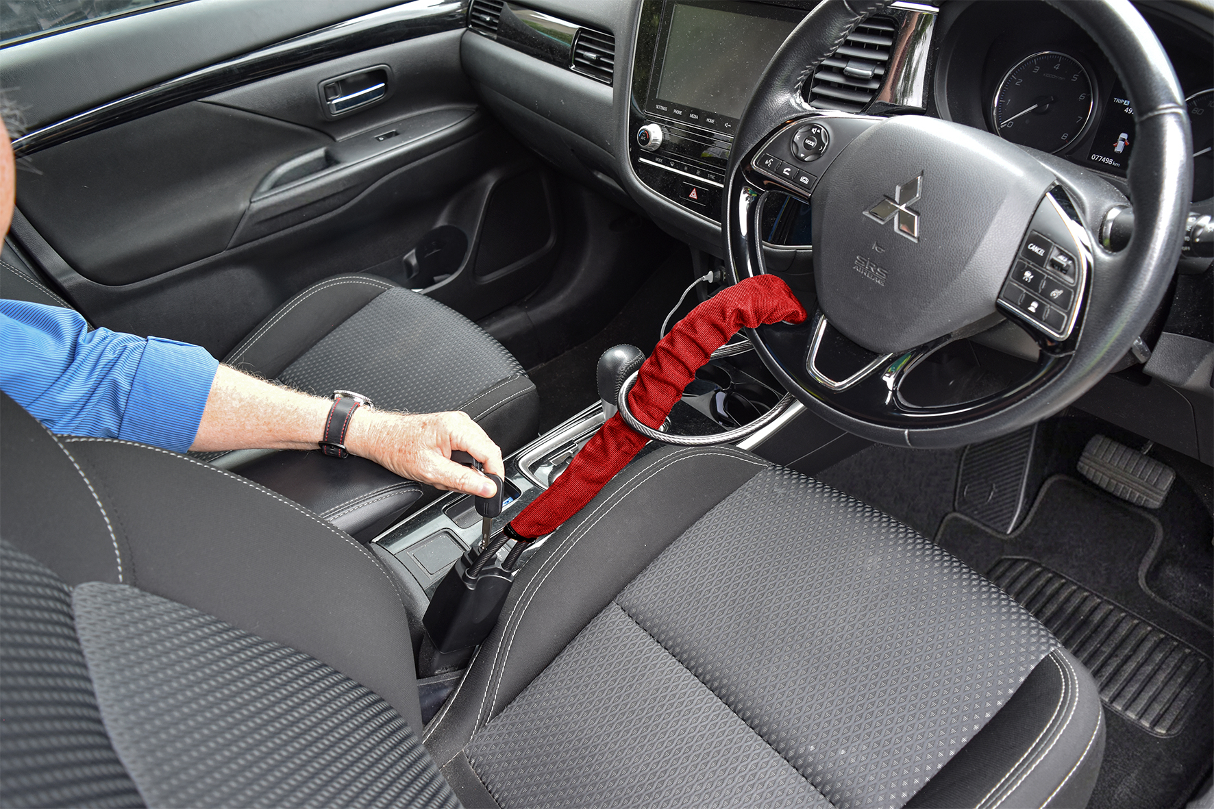 Seat Belt Mounted Steering Wheel Lock